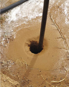 Figure 10.110b - The Waterjet Stinger (A) injects high-pressure water into the soil, turning it to a slurry (B) into which a live stake can be inserted (Photos courtesy of Chris Hoag).