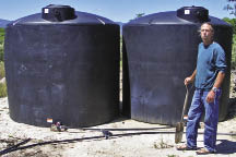 Figure 10.138 - Large holding tanks are used for temporary drip irrigation systems (A). A simple on/off valve controls water to the gravity-feed system (B). Pressure release valves (C) are used to control water pressure on hilly sites. 