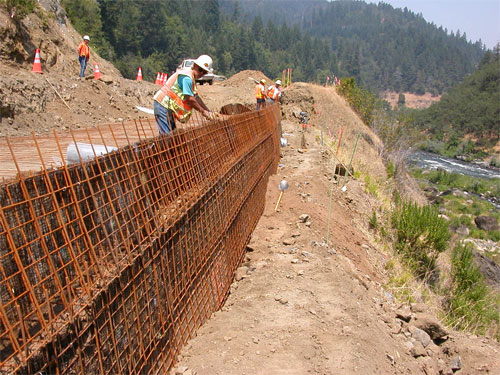 Photo - screening road from river